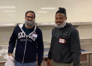 Two Azara team members volunteering at Community Servings