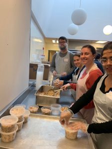 Azara employees packaging food