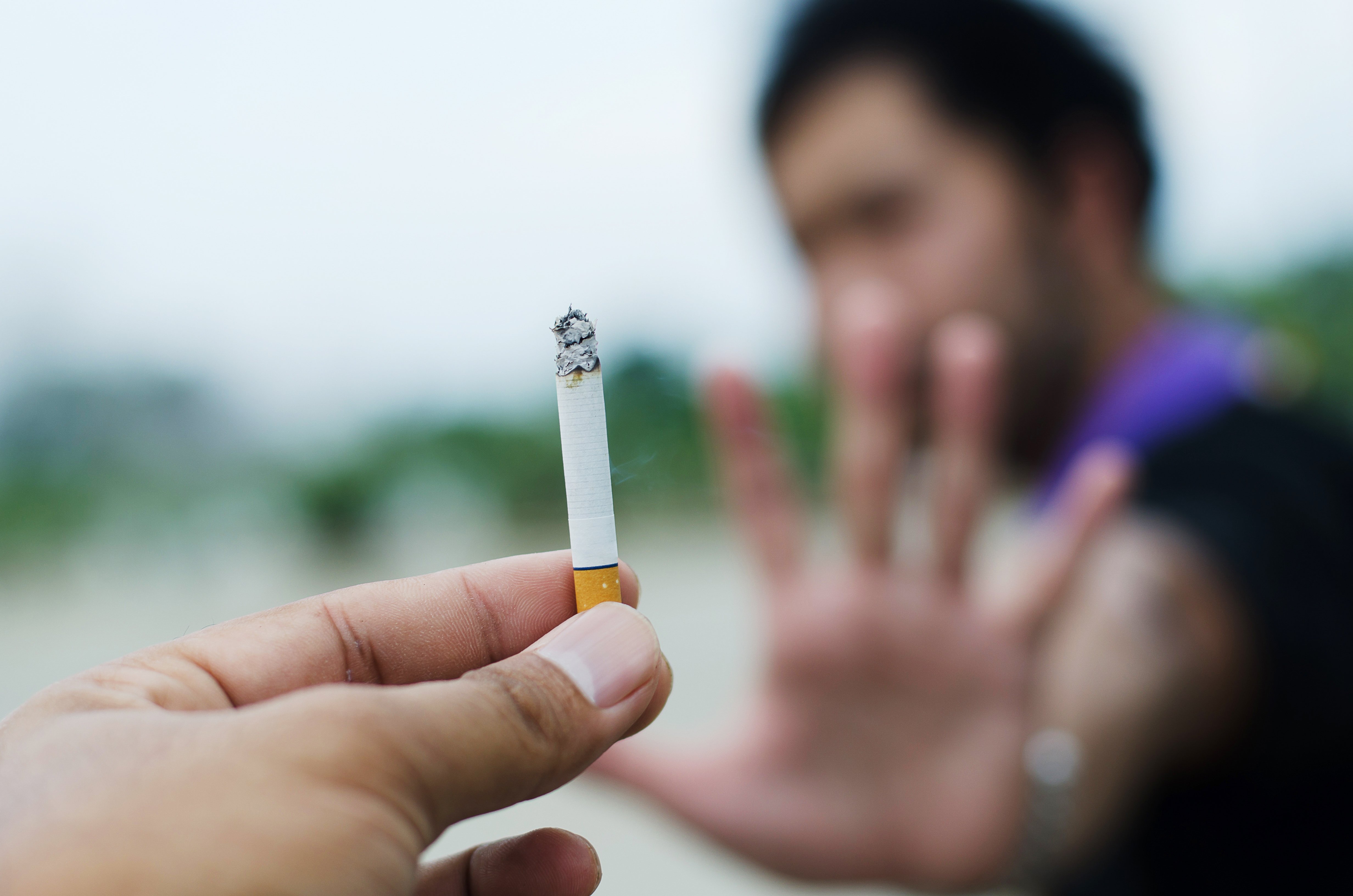 Person refusing a cigarette, representing tobacco prevention