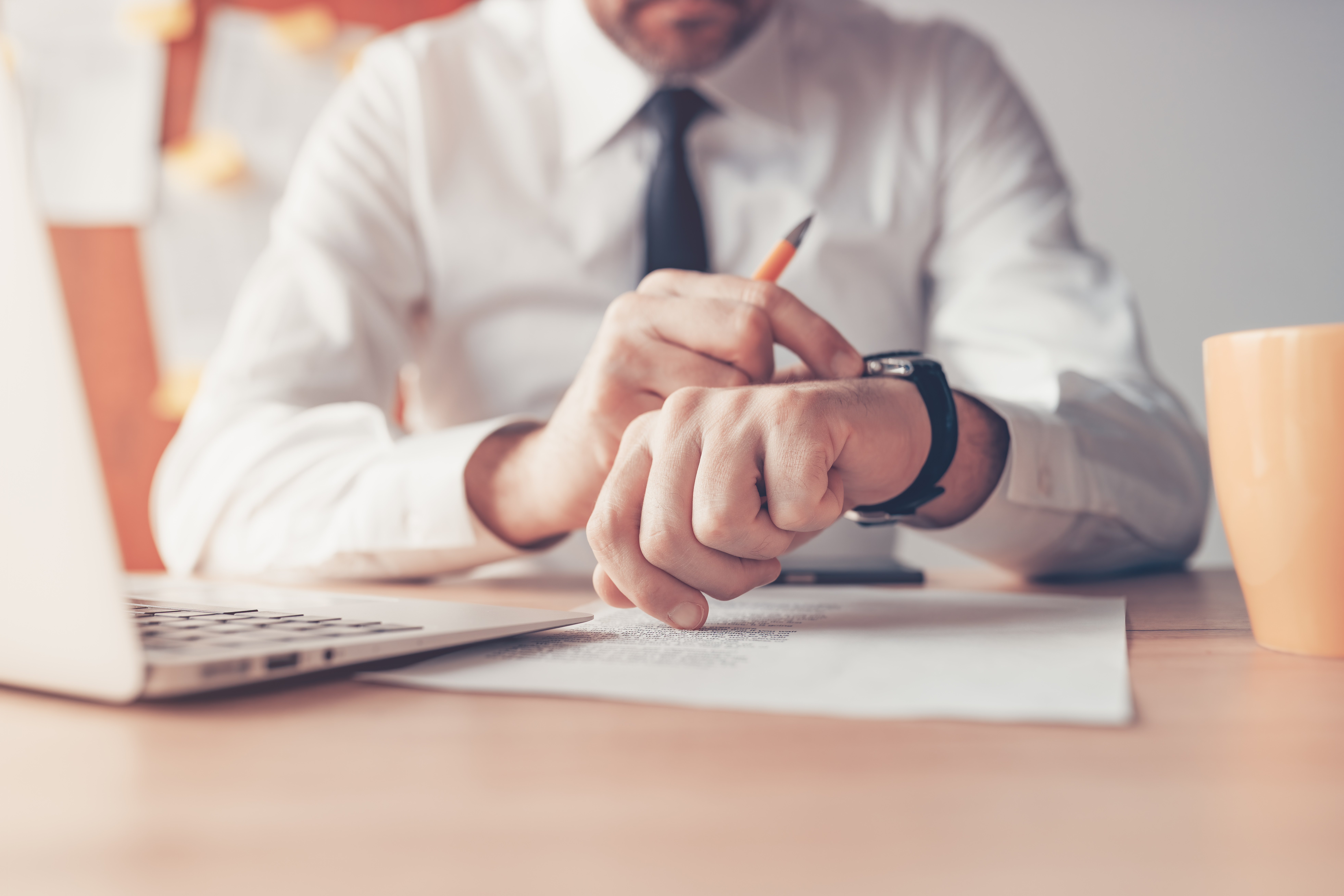 Image of a medical professional checking their watch